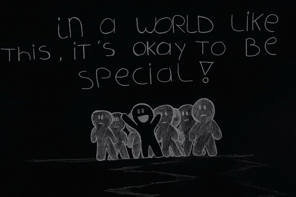 Drawing in white chalk on a blackboard