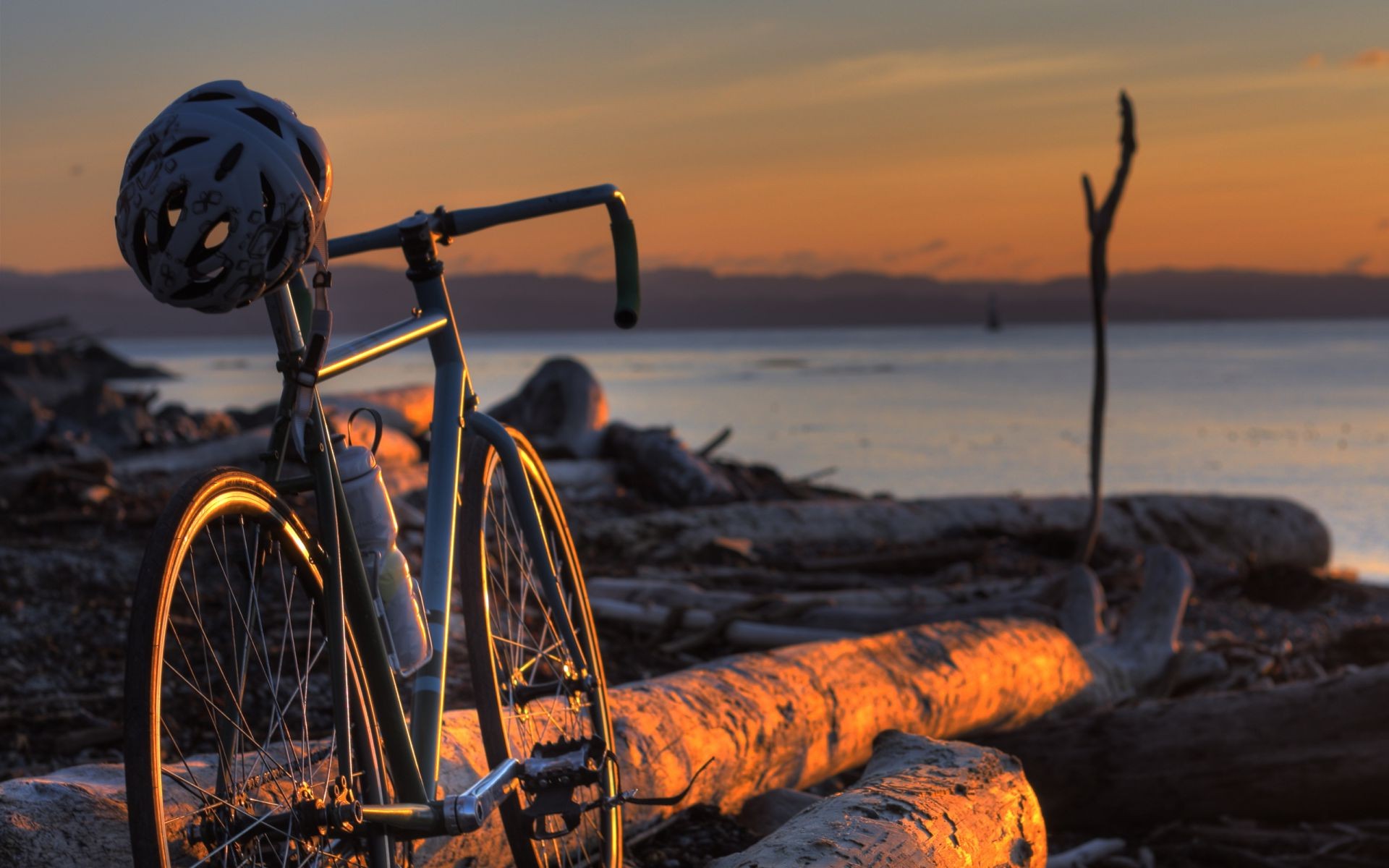 water beach sunset sea ocean wheel boat seashore travel outdoors