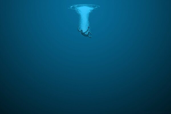 A man falling into a watery abyss
