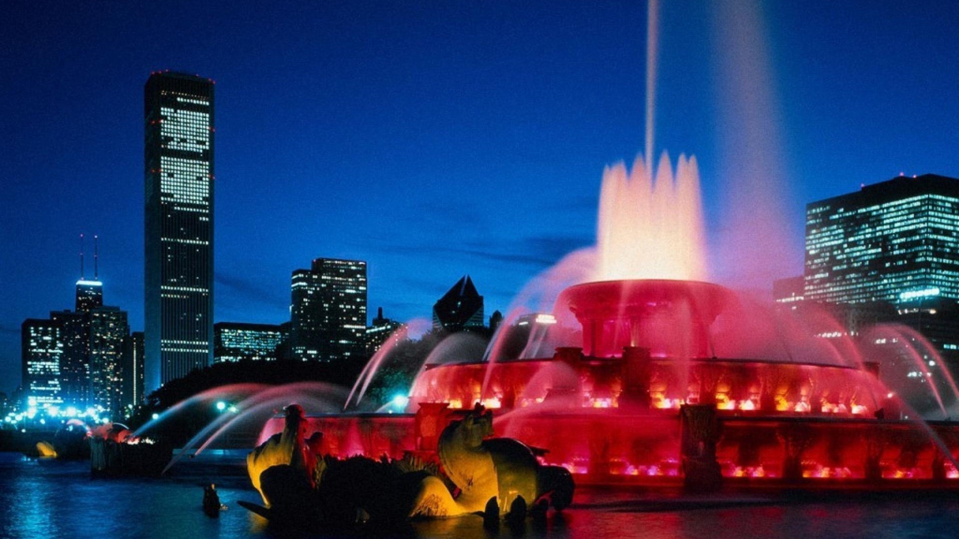 city downtown skyscraper cityscape evening dusk travel skyline architecture building urban light street sunset bridge water reflection illuminated river sky