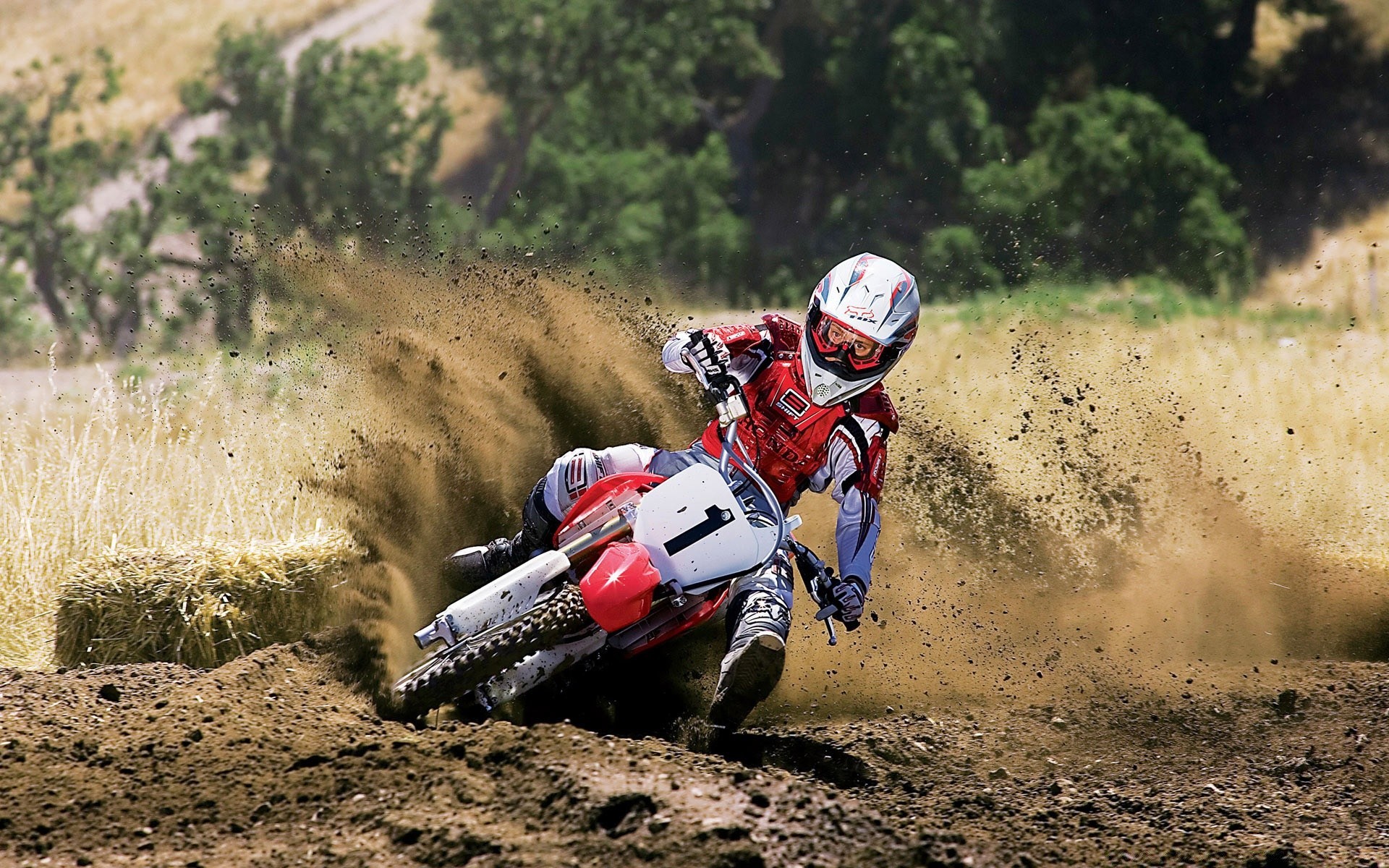 sports race soil competition hurry action vehicle track dust racer motion helmet fast rider bike road man championship